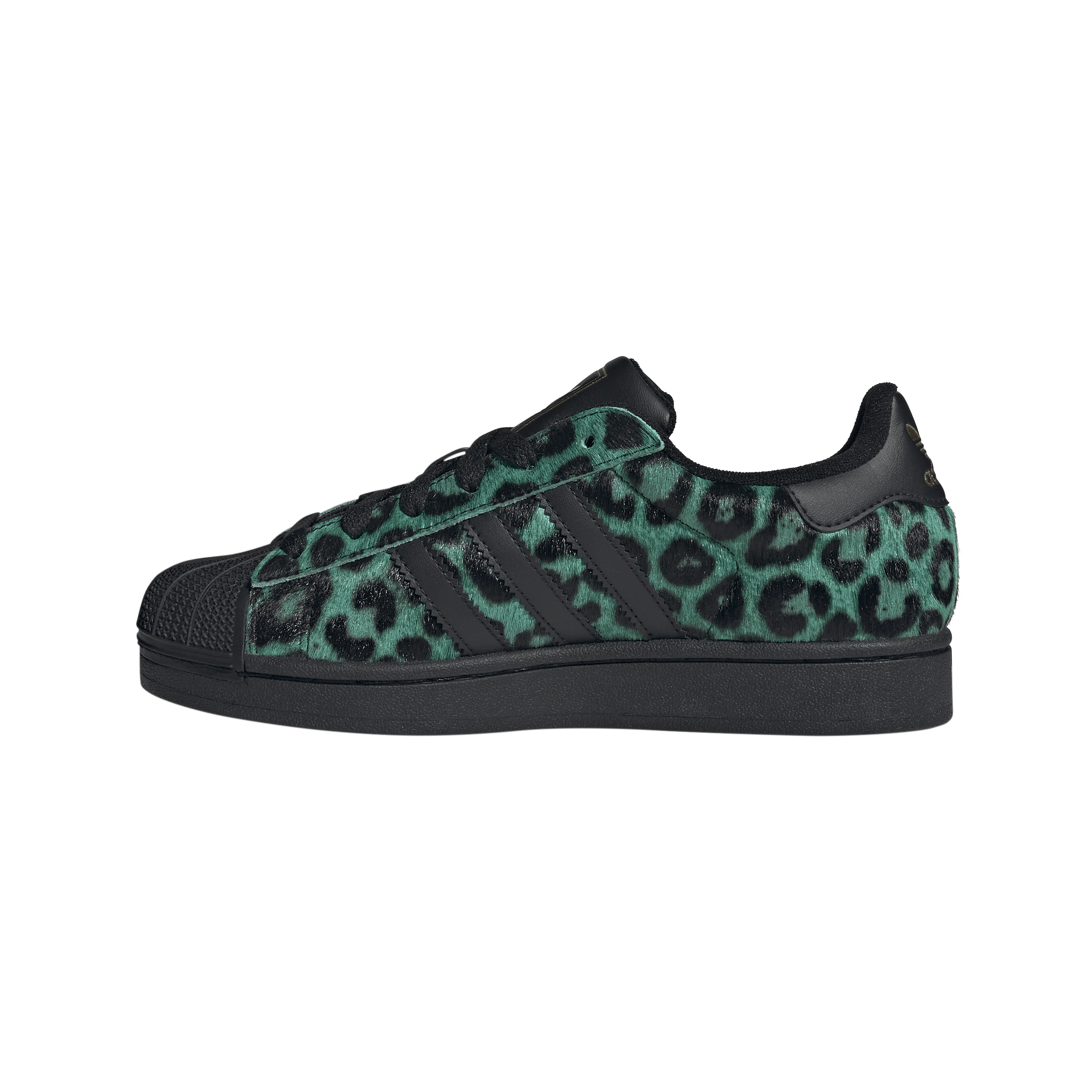 Close-up of a green and black leopard-print sneaker with black sole and laces.