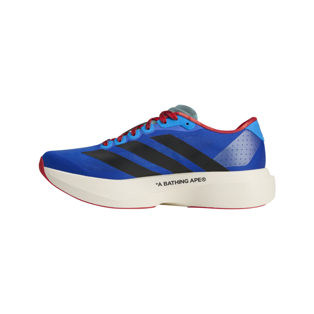Blue and red sneaker with black stripes and a white sole; A BATHING APE branding on the midsole