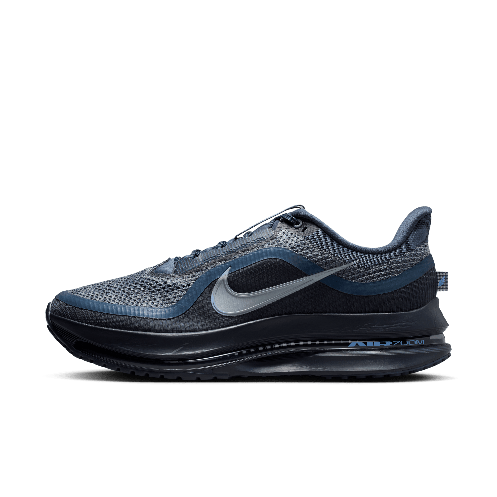 Close-up of a gray-blue running shoe with mesh upper and dark sole against a teal background