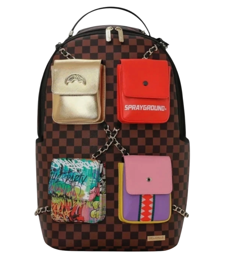 Brown checkerboard backpack with six small colorful pouches attached by metal chains: gold flap pouch, red Sprayground pouch, graffiti blue-green pouch, and pink-yellow-purple pouch.